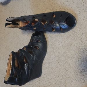Black open toe 3.5 inch wedge heel, zipper closure, good condition, size 9.5